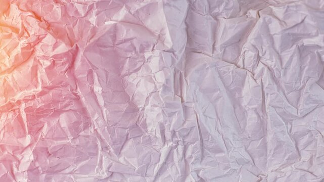 crumpled silver texture shimmering under dynamic studio lighting creating abstract metallic pattern 4k video.
