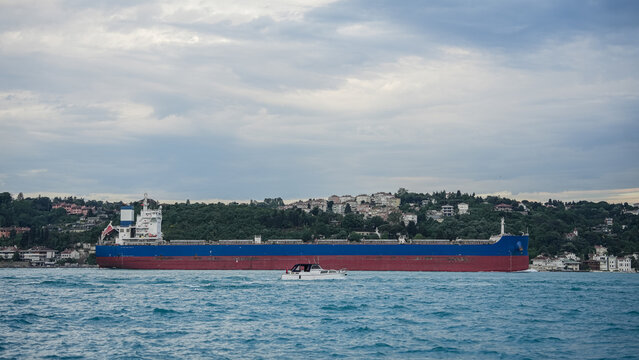 Large commercial cargo ships transit the Bosphorus Strait on their way to the Strait of Hormuz. Cargo ships bound for the Strait of Hormuz.