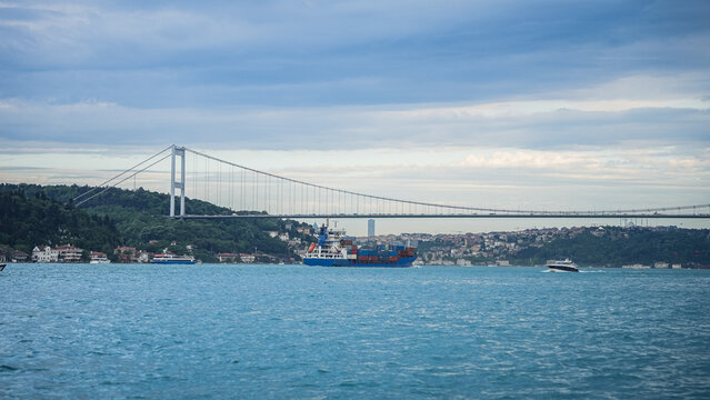 Large commercial cargo ships transit the Bosphorus Strait on their way to the Strait of Hormuz. Cargo ships bound for the Strait of Hormuz.