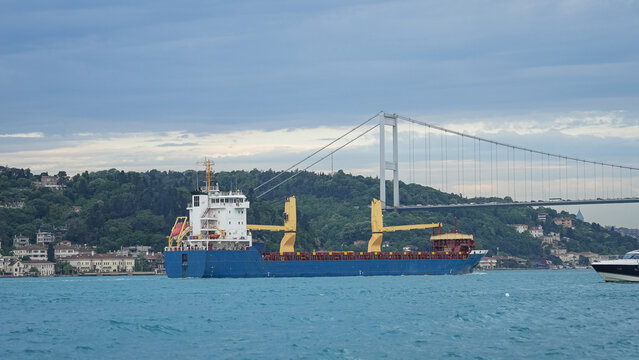 Large commercial cargo ships transit the Bosphorus Strait on their way to the Strait of Hormuz. Cargo ships bound for the Strait of Hormuz.