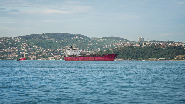 Large commercial cargo ships transit the Bosphorus Strait on their way to the Strait of Hormuz. Cargo ships bound for the Strait of Hormuz.