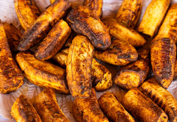 Fototapeta premium A generous portion of roasted ripe plantains, a traditional Colombian dish.