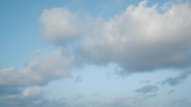 timelapse of clouds in blue sky