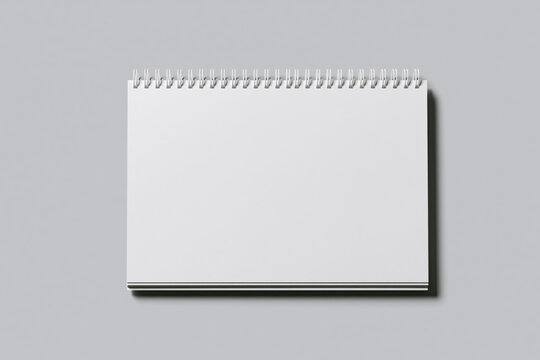 Spiral notebook mockup blank white cover minimal design front view gray background closed notebook paper pad ring binding shadow clean layout