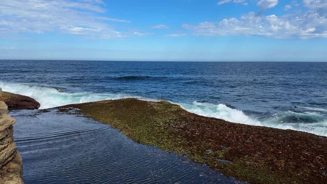 Ocean Waves Flowing Over Flat Coastal Sandstone Rock Platform with Green Moss at Gordons Bay Sydney Australia, Natural Tidal Movement, Scenic Sea Landscape 4K