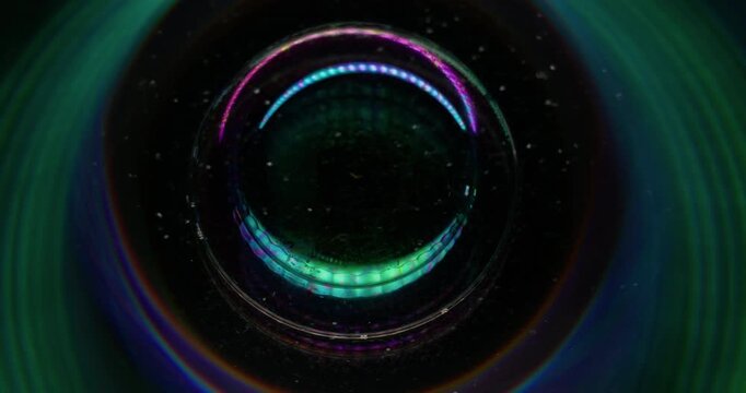 Holographic sphere. Round portal. Fantasy circle lens reflection light flare. Bubble prism mix swirl flow glow defocused background.