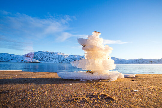 Pyramid of ice floes on shore of Barents Sea