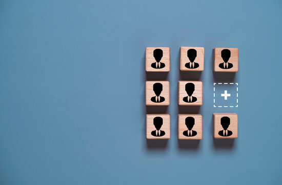 Wooden blocks with employee icons and an empty position for recruitment hiring, talent acquisition, workforce planning, human resources, candidate selection, team expansion and staffing strategy.