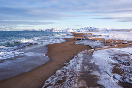 Barents Sea Shore. Kola Peninsula winter landscape