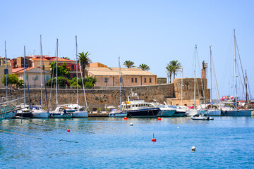 Obraz premium Historic city walls and harbor of Alghero, Sardinia, Italy