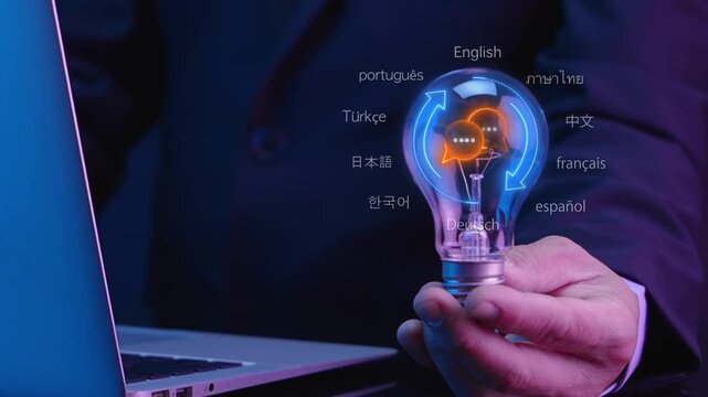 Hand holding lightbulb with glowing language translation globe icon. Global communication and online dictionary concept.