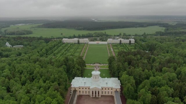 Drone ascending over palace estate and gardens
