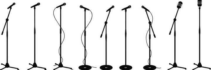 Collection of black microphone stands with different cable shapes on white background audio sound © MdMirajul
