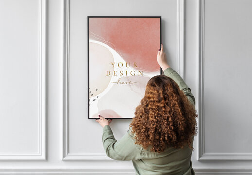 Woman Hanging Abstract Art Frame Mockup PSD