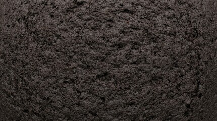 Fototapeta premium Dark Chocolate Cake Texture Background Close Up Macro Shot of Porous Brownie Surface for Food Photography and Culinary Design Projects