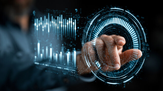 Professional worker manipulates a sophisticated holographic display showing complex bar graphs and a rotating circular digital structure for data management.
