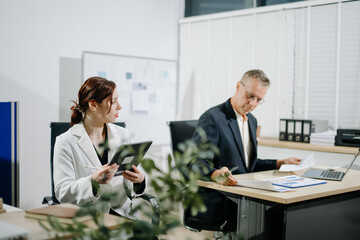 Fototapeta premium Professional business meeting in a modern office with finance documents, teamwork, strategy, tablet and corporate collaboration