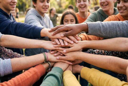 Young friends connect in a vibrant display of unity and support outdoors
