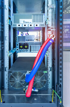 server racks with a liquid cooled supercomputer system with tube  