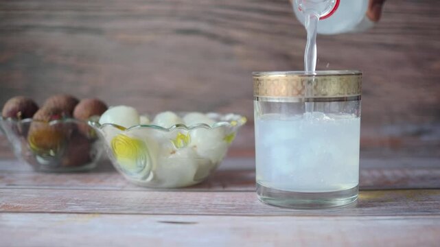 Refreshing lychee drink on a table