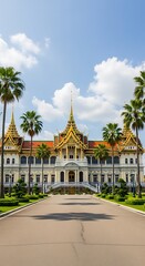 Obraz premium Ornate Royal Palace Standing Among Palm Trees Under Blue Sky