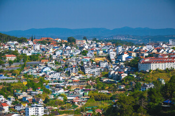 Fototapeta premium Panorama with aerial view of city of Dalat in Vietnam in Asia
