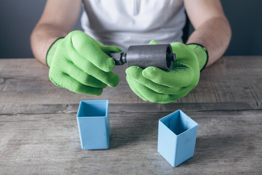 a man holds a puller in his hand