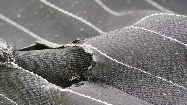 Broken fabric reveals stories of wear and tear