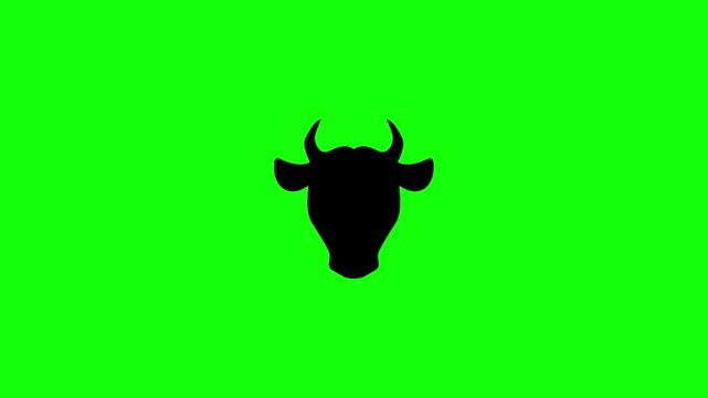 Black silhouette of a cow head isolated on a bright green background for graphic design projects