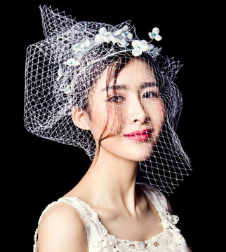 Asian sexy young woman on black background