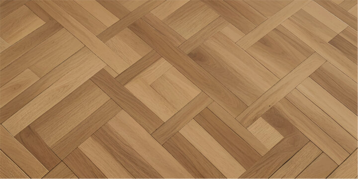 Elegant herringbone pattern of light brown wooden flooring.