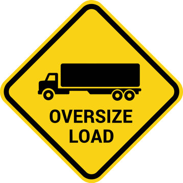 A large truck oversize sign warns drivers on road ahead