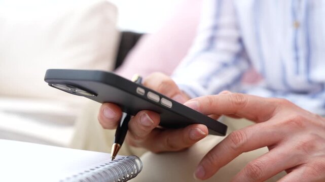 Close up  Hand using finger to sign digital document on smartphone. Electronic signature, Online contract, Paperless approval, Remote business, Secure authentication, Digital workflow