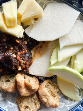 Plate of Asian Rojak with fried tofu and shrimp paste