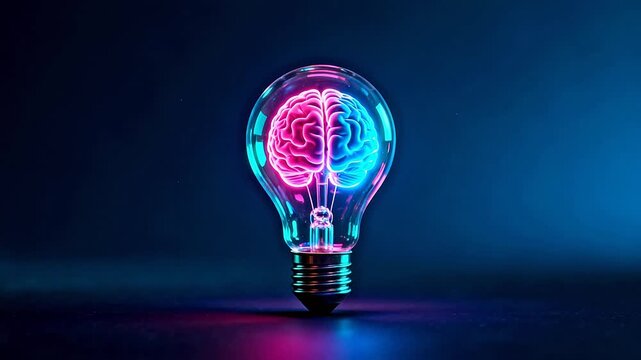 Light bulb with glowing brain
