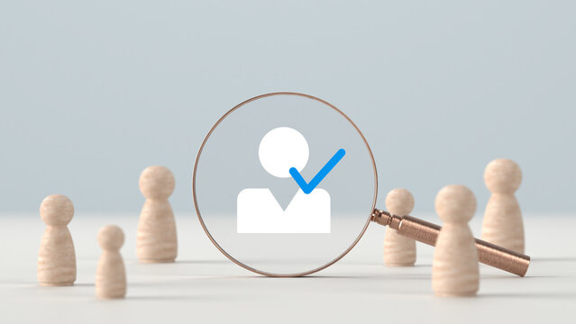 Wooden figures standing around a magnifying glass examining a selected user profile icon with a blue checkmark on a plain light background