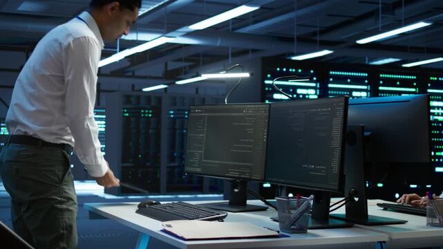 Computer scientist provides technical support inside a data center setting, using network security, data protection and database reliability as part of enterprise server administration