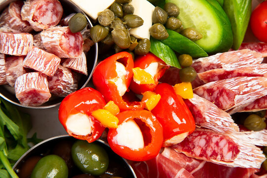 Table full of mediterranean appetizers or antipasto. Assorted Italian food set.