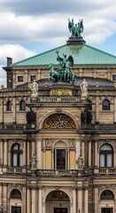 Fototapeta premium Ornate Historic Opera House Facade with Sculptures and Green Copper Roof in Paris