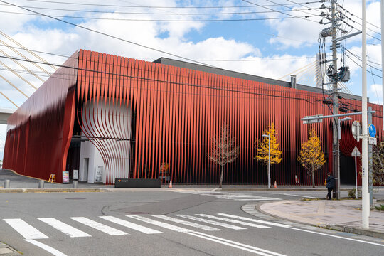 Nebuta Museum Wa Rasse, Aomori, Japan - Nov. 15, 2023: Red slatted facade of Nebuta Museum.