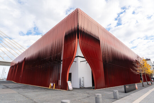 Nebuta Museum Wa Rasse, Aomori, Japan - Nov. 15, 2023: Red slatted facade of Nebuta Museum.