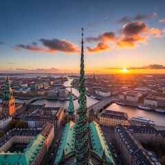 Obraz premium Historic Copper Church Spire Rising Above Copenhagen City Skyline at Sunset