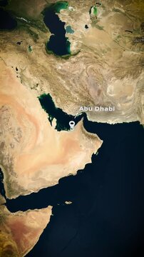 Vertical satellite map zoom to Abu Dhabi with location marker for mobile travel and geography storytelling

