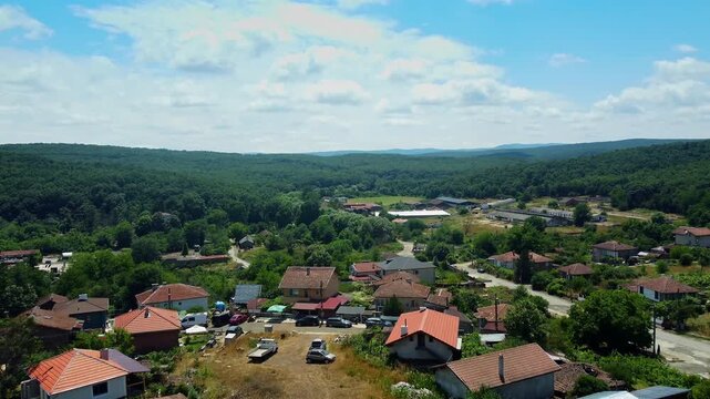 Flying over Yasna Polyana village, surrounded by dense forests in Bulgaria