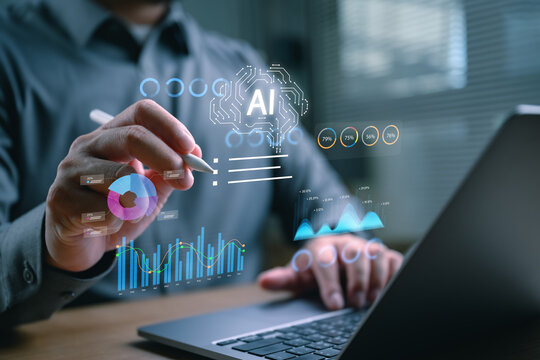 AI data analytics dashboard displayed above a business professional using a laptop, business intelligence, machine learning, predictive analytics, digital transformation and enterprise technology.