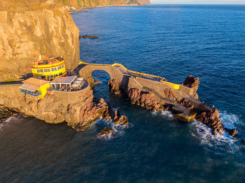 Aerial view shows Cais da Ponta do Sol on a cliff in Madeira