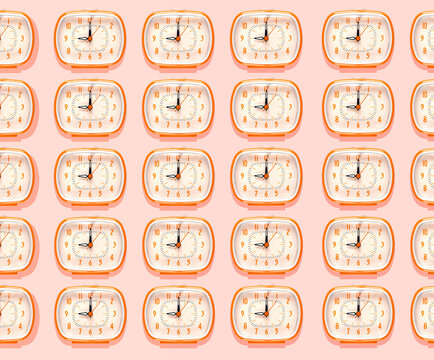 3D Illustration, row of orange alarm clocks at nine o'clock pattern on pink background
