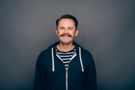 Portrait of smiling man with moustache
