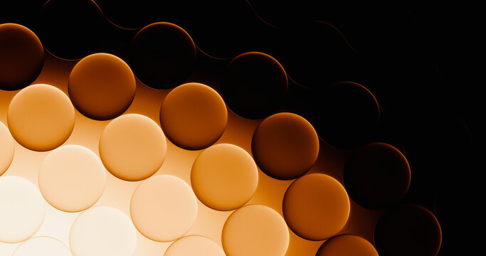 Glowing orange glass spheres form a modern geometric pattern