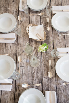 Festive laid table for six persons, partial view